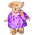 Eva bear just loves to dress up.  Today she is dressed in a purple  dress, The dress is deep purple with bows scattered throughout the skirt.  Purple satin ribbon trimmed with gold circles the waist with a purple rose in the centre.  The shoulder straps fasten with bows and there is a pashmina too!  Beautiful gift idea for, Birthday, Wedding Anniversary, Get Well, Mothers Day, Exclusive to The Teddy Bear Village.