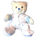 Blue Nose Bear in an all in one white sleep suit.
White sleep suit has blue teddy bear paws throughout with contrasting blue cuffs. Beautiful gift for the new born baby.  Add a presentation balloon and have it delivered directly to the new arrival at the hospital or home